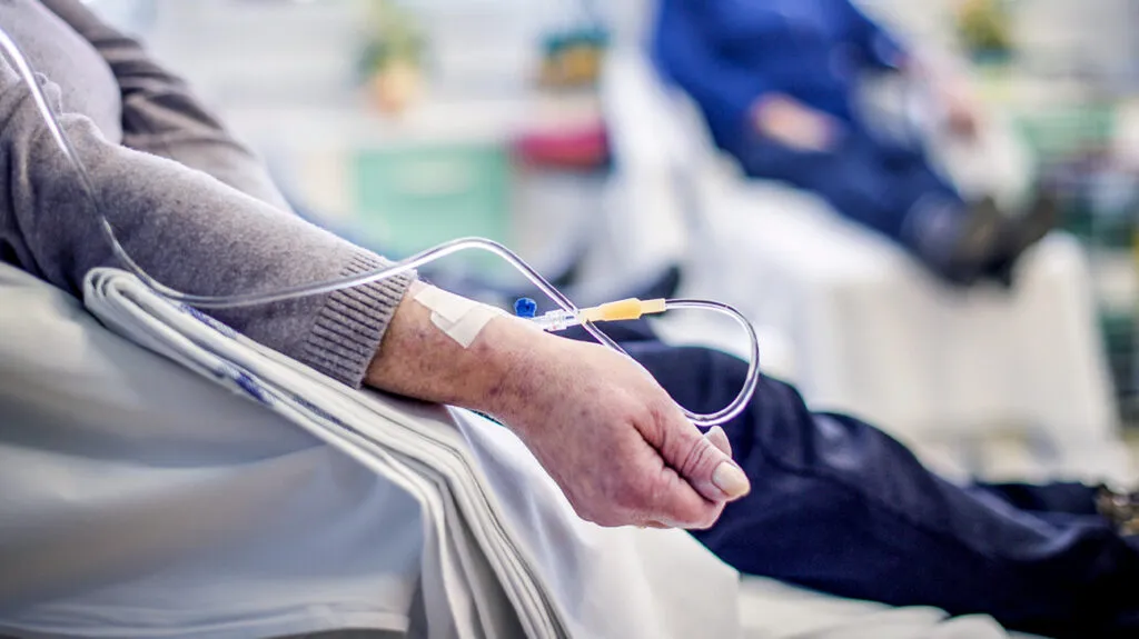 Cancer patient undergoing chemotherapy (goodbishop/Shutterstock)